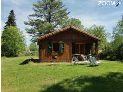 photo de Gite-Chalet Bois dans le Cantal avec pêche privé- WIFI offert